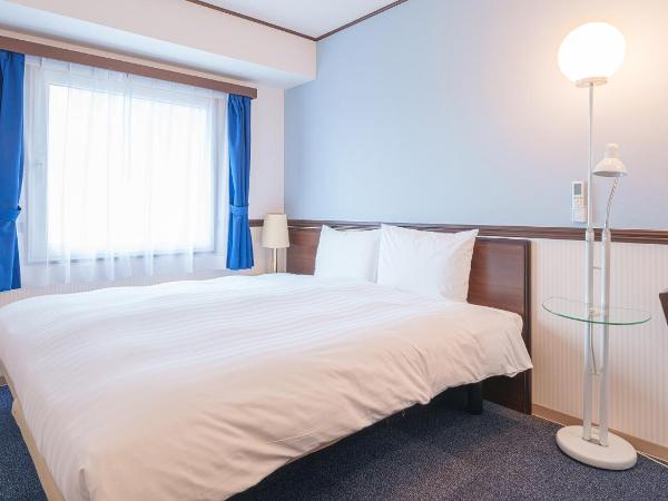 Toyoko Inn Shin-Osaka-eki Higashi-guchi : photo 1 de la chambre chambre lit king-size - fumeurs