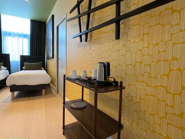 Hôtel Le Blason : photo 7 de la chambre suite junior