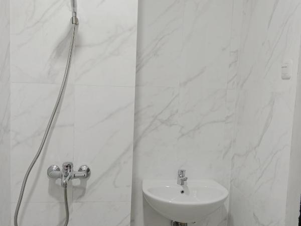 Andita Syariah Hotel : photo 3 de la chambre chambre lits jumeaux deluxe