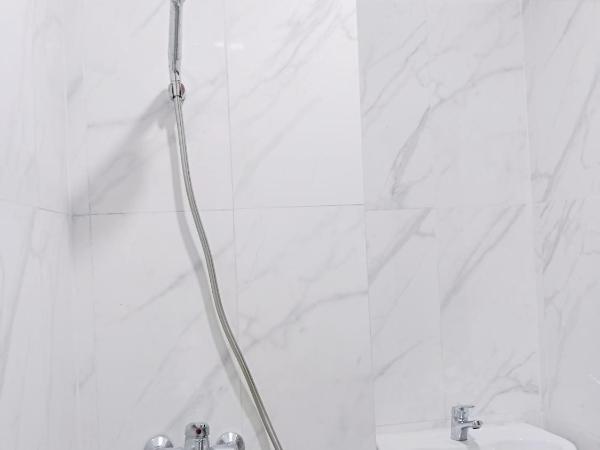 Andita Syariah Hotel : photo 1 de la chambre chambre double standard