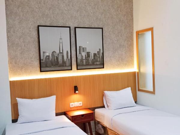 Andita Syariah Hotel : photo 1 de la chambre chambre lits jumeaux standard