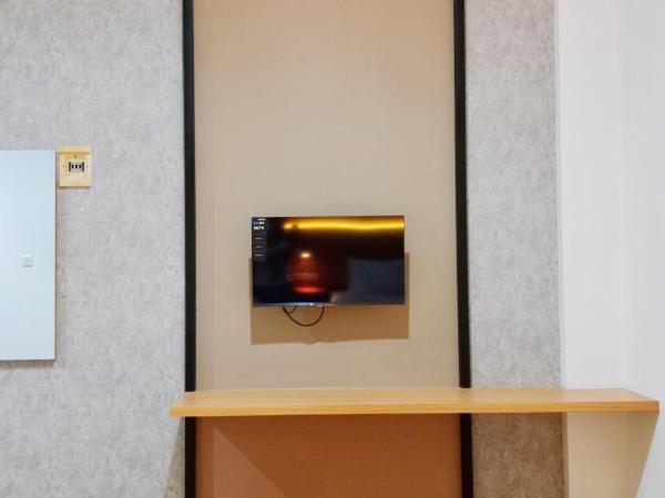 Andita Syariah Hotel : photo 2 de la chambre chambre lits jumeaux standard