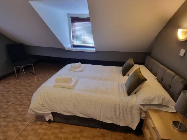 Manchester Stay Hotel - Free Parking : photo 2 de la chambre attic double/family triple en-suite with kitchenette 