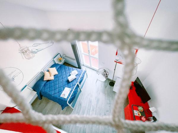 Ostello Bello Genova : photo 1 de la chambre chambre quadruple avec salle de bains privative