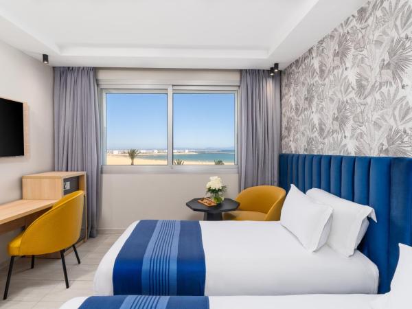 Kenzi Solazur : photo 4 de la chambre chambre lits jumeaux supérieure - vue latérale sur mer