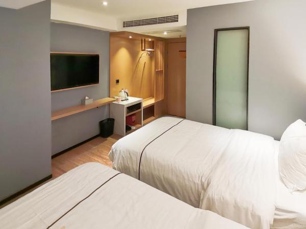 Lanerz Hotel - Shenzhen Futian District Huaqiang Road Metro Station : photo 1 de la chambre chambre lits jumeaux supérieure