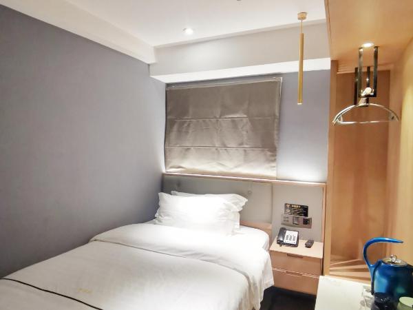 Lanerz Hotel - Shenzhen Futian District Huaqiang Road Metro Station : photo 2 de la chambre chambre simple