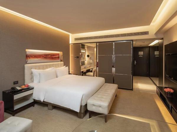 Furama Hotel Dalian : photo 1 de la chambre premier king size bed room - west wing