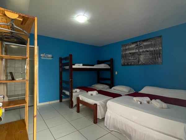 Pousada Jardim Magico : photo 3 de la chambre chambre familiale deluxe