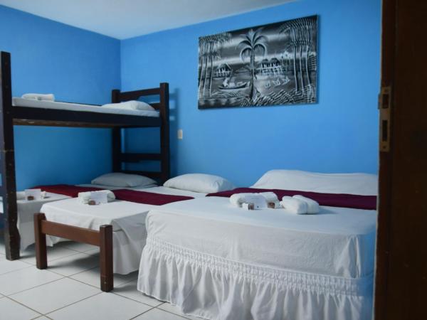 Pousada Jardim Magico : photo 2 de la chambre chambre familiale deluxe