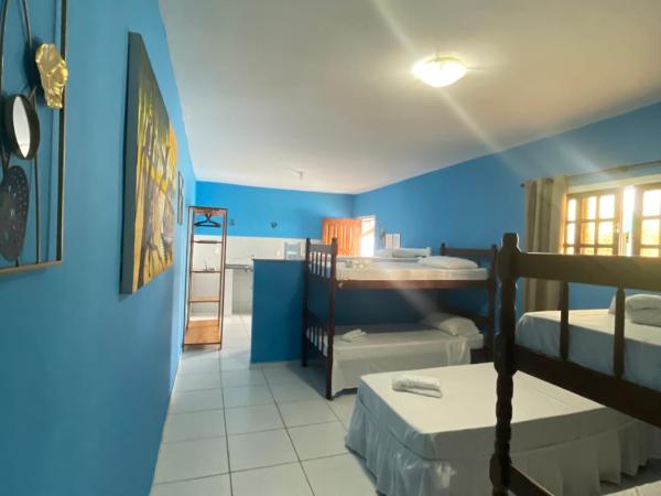 Pousada Jardim Magico : photo 2 de la chambre chambre quadruple avec salle de bains privative