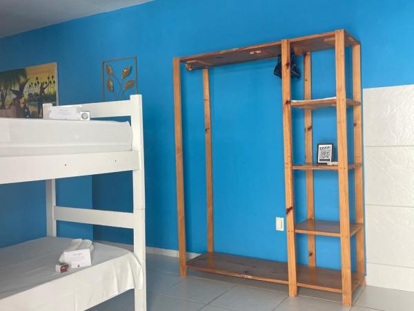 Pousada Jardim Magico : photo 3 de la chambre chambre quadruple avec salle de bains privative