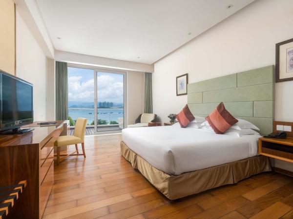 Mingshen Golf & Bay Resort Sanya : photo 1 de la chambre chambre lit king-size - vue sur mer