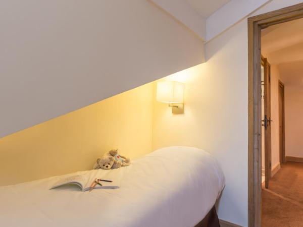 Résidence Pierre & Vacances Premium Les Chalets du Forum : photo 6 de la chambre two-bedroom duplex apartment with 2 sleeping alcove and balcony (10 people)