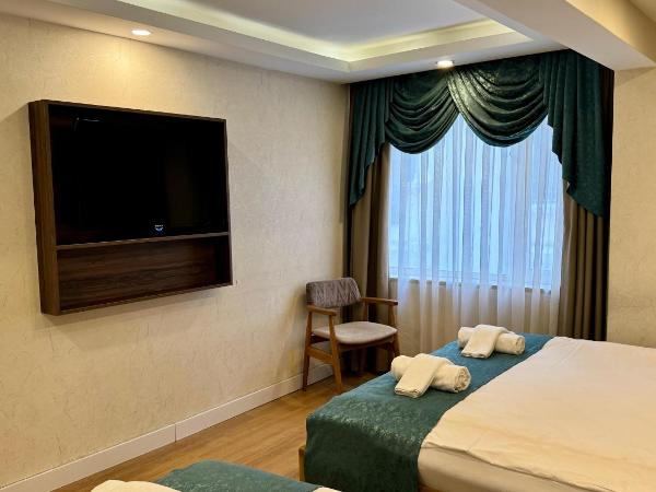 Burj Al Istanbul : photo 3 de la chambre chambre triple de luxe