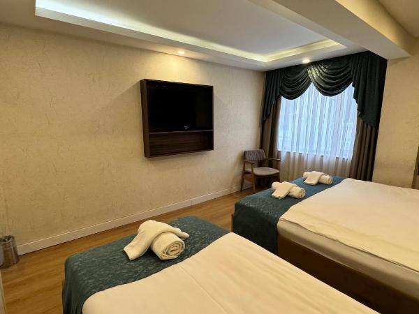 Burj Al Istanbul : photo 6 de la chambre chambre triple de luxe