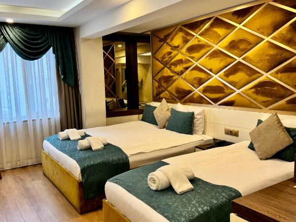 Burj Al Istanbul : photo 8 de la chambre chambre triple de luxe