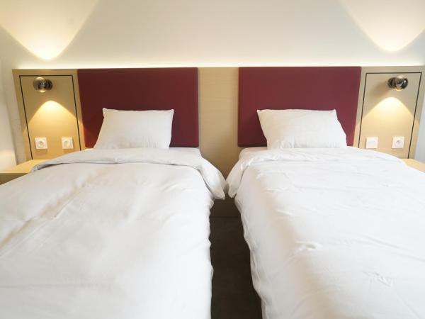 Anaïs Hôtel Bourges Nord Saint-Doulchard : photo 2 de la chambre chambre lits jumeaux pour personnes à mobilité réduite