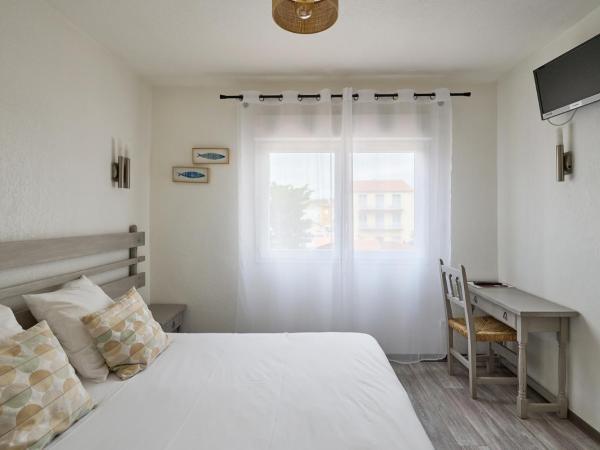 Hôtel Les Mimosas : photo 1 de la chambre chambre double standard avec balcon et climatisation