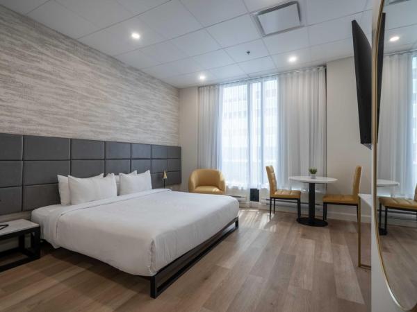 Travelodge by Wyndham Montreal Centre : photo 1 de la chambre suite lit king-size – non-fumeurs