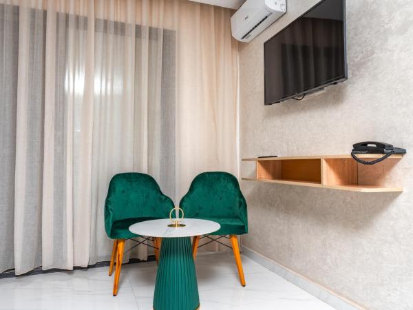 Maarif Elite Suites : photo 9 de la chambre appartement avec balcon