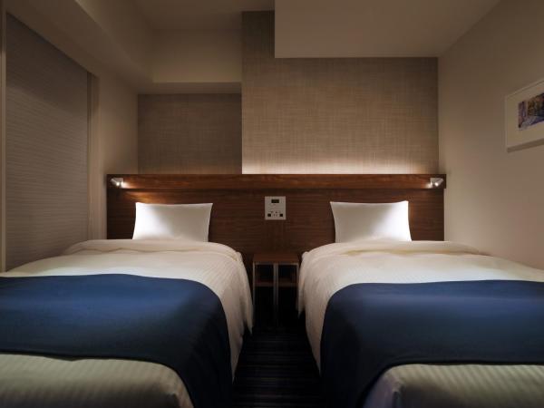 Keio Presso Inn Tokyo Station Yaesu : photo 2 de la chambre chambre lits jumeaux - non-fumeurs