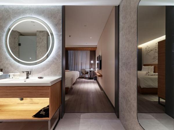 UrCove by HYATT Nanjing South Railway Station : photo 4 de la chambre chambre lits jumeaux deluxe