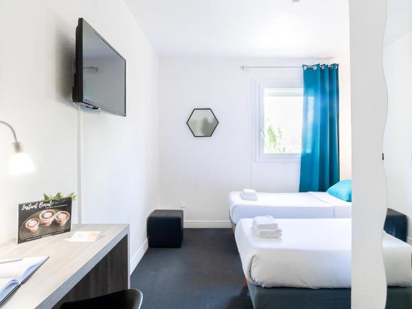 Hôtel Lapeyronie : photo 6 de la chambre chambre lits jumeaux