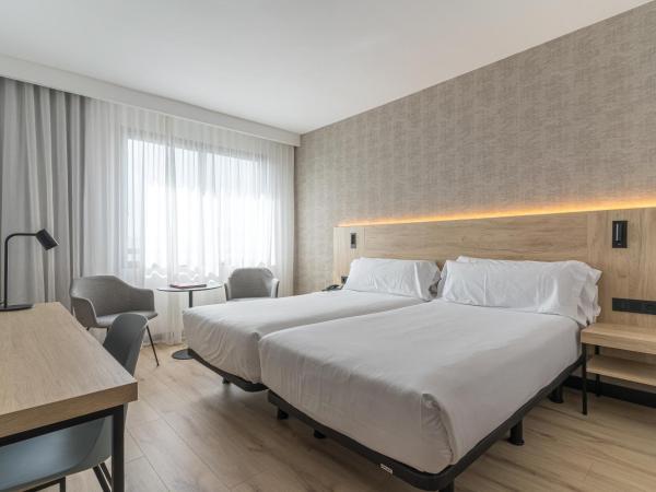 Hotel Blanca de Navarra : photo 2 de la chambre hébergement familial avec 2 chambres communicantes