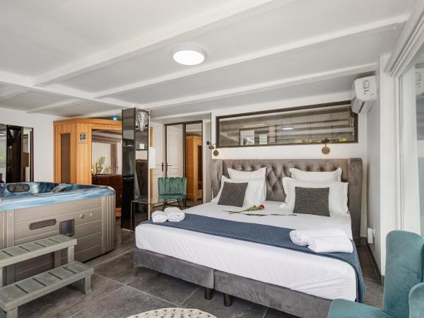 Villa Rasoa : photo 2 de la chambre chambre lit king-size - vue sur jardin
