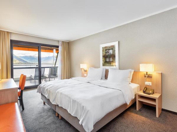 H4 Hotel Arcadia Locarno : photo 2 de la chambre suite