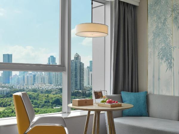 Shenzhen Grand Skylight Garden Hotel : photo 5 de la chambre chambre lits jumeaux - vue sur jardin