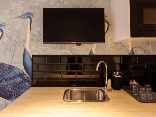 Welldone Sierpes Boutique : photo 5 de la chambre chambre triple exécutive