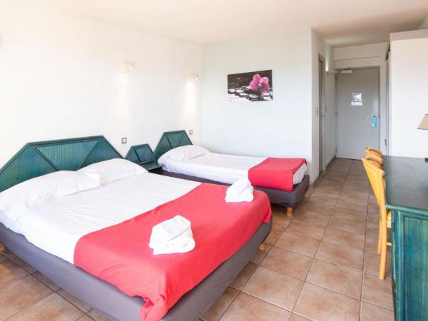 Village Club Miléade Calvi : photo 2 de la chambre chambre triple