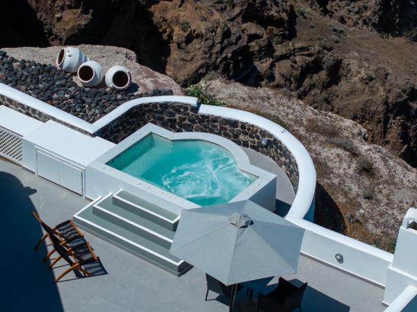 Petit Palace Suites : photo 1 de la chambre exclusive suite with outdoor heated jetted hot tub and caldera view