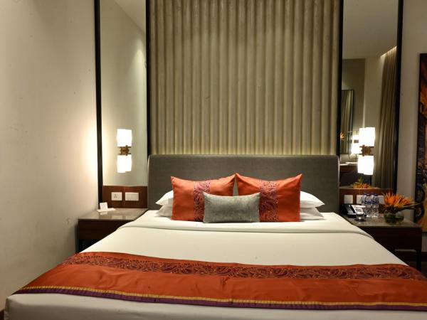 Vivanta Kolkata EM Bypass : photo 1 de la chambre chambre lit king-size premium - vue sur ville