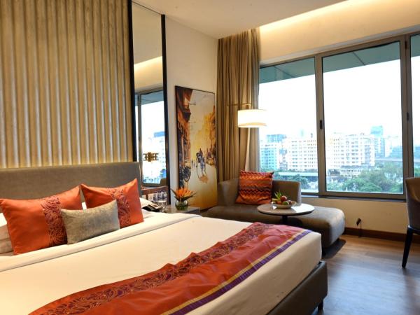 Vivanta Kolkata EM Bypass : photo 2 de la chambre chambre lit king-size premium - vue sur ville