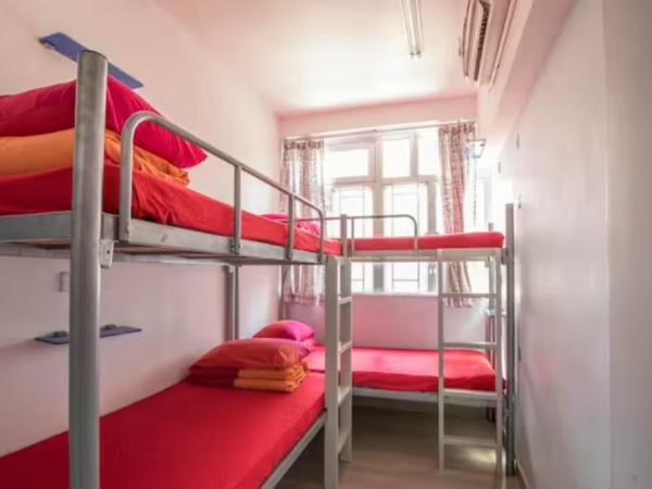 Check Inn HK : photo 1 de la chambre chambre quadruple Économique avec salle de bains commune