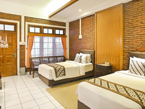 Paku Mas Hotel : photo 3 de la chambre chambre lits jumeaux deluxe