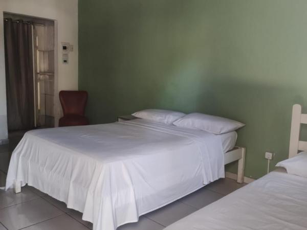 LM Suítes : photo 3 de la chambre suite familiale