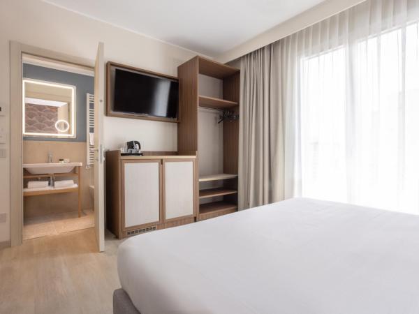 Hotel Diana : photo 1 de la chambre chambre triple deluxe avec balcon