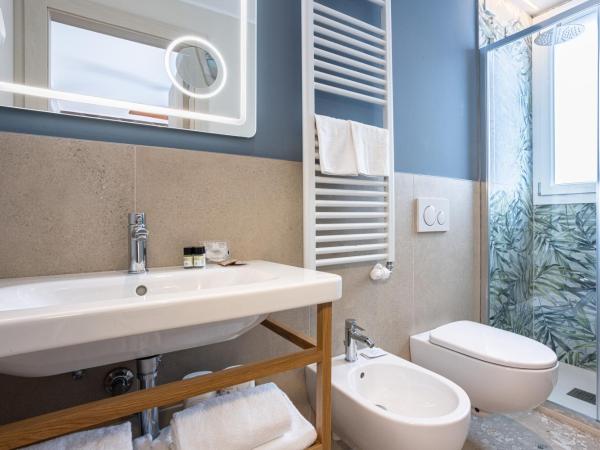 Hotel Diana : photo 10 de la chambre chambre triple deluxe avec balcon