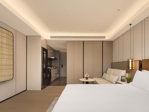 Modena By Fraser Nansha Guangzhou : photo 1 de la chambre studio deluxe lit king-size