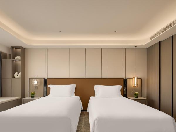 Modena By Fraser Nansha Guangzhou : photo 1 de la chambre studio lits jumeaux deluxe