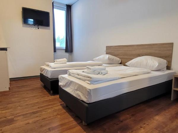 Queens Residenz : photo 8 de la chambre chambre lits jumeaux