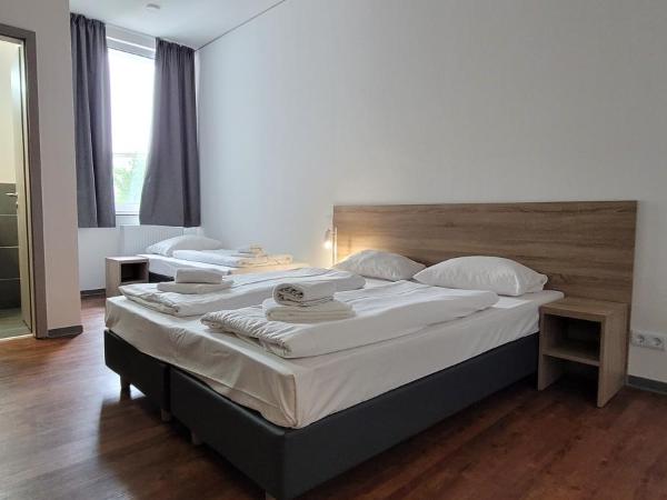 Queens Residenz : photo 7 de la chambre chambre triple