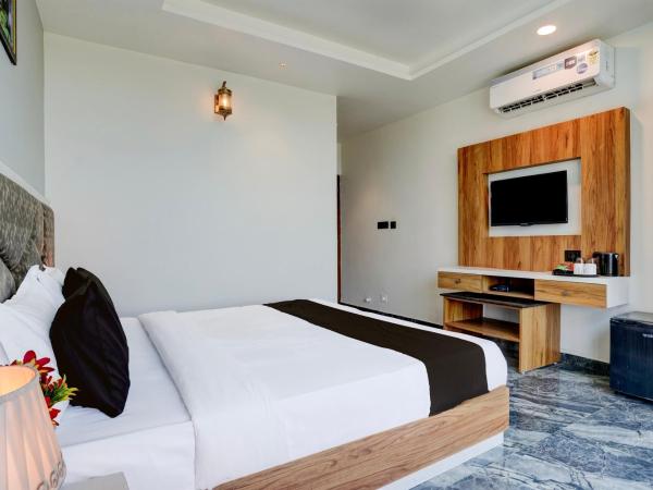 Super Hotel O Om Tapovan : photo 6 de la chambre chambre triple classique