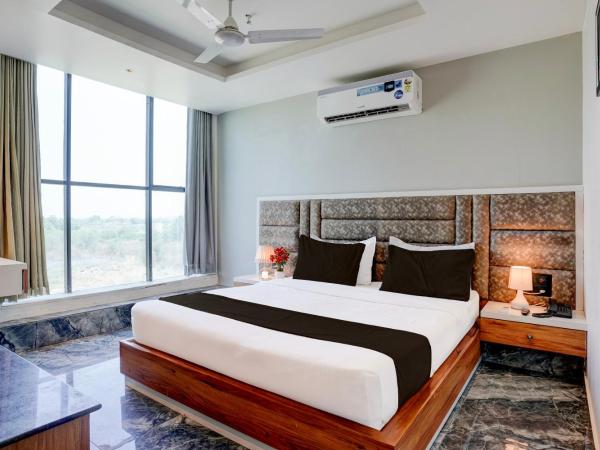 Super Hotel O Om Tapovan : photo 9 de la chambre chambre triple classique