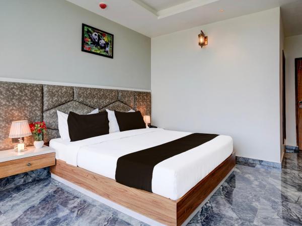 Super Hotel O Om Tapovan : photo 7 de la chambre chambre triple classique