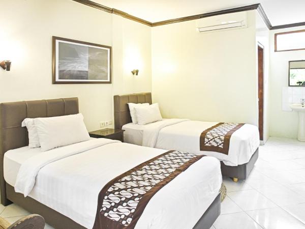 Paku Mas Hotel : photo 1 de la chambre chambre lits jumeaux supérieure